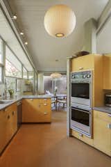 The updated kitchen maintains a midcentury feel.&nbsp;