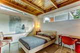 The bedrooms feature original exposed wood ceilings and clerestory windows for additional natural lighting.&nbsp;