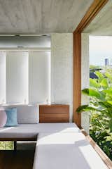 Living Room, Bench, and Sofa The minimalist material palette is a mix of whitewashed stucco, wood, and concrete.  Photo 6 of 11 in An Australian Cottage Gets a Mediterranean-Inspired Revamp