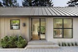 Exterior, House Building Type, Metal Roof Material, Wood Siding Material, Mid-Century Building Type, Concrete Siding Material, and Gable RoofLine Thanks to a complete revamp, this midcentury gem now has a fresh new look. 

  Photos from An Iconic Portland Midcentury Is Seeking a New Owner For $1.6M