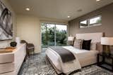 The home features four bedrooms, all with en-suite baths. Three of the suites are located on the lower level.&nbsp;