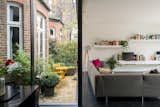 On the other side of the sitting room is a small courtyard, framed by internal glazing and accessed via a glazed side-door. 

