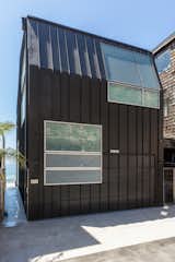 Exterior, Metal, House, Beach House, Gable, and Metal Corrosive sea air can deteriorate metals and slowly peel away paint, so the architects wrapped the building in aluminum and a non-corrosive metal, and coated it in a resilient rustproof paint.

  Exterior Metal Beach House Gable Photos from Own This Sustainably Designed Malibu Beach House For $5.7M