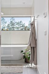 Bath Room, Freestanding Tub, Porcelain Tile Floor, Recessed Lighting, and Full Shower The zen-like bathroom.  Photos from Picture Yourself  in This Clifftop Swedish Retreat Asking $1.08M