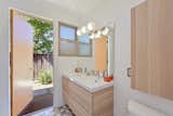 Bath Room, Wall Lighting, Cement Tile Floor, Drop In Sink, and Two Piece Toilet The second bath is accessible from the outdoors.  Photos from This Stunning Bay Area Eichler Just Listed For $775K