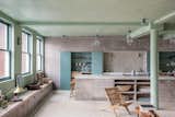 Kitchen, Ceiling Lighting, Ceramic Tile Backsplashe, Terra-cotta Tile Floor, Vessel Sink, Colorful Cabinet, and Pendant Lighting The original, steel-framed Crittall windows reference the space's past as a former shoe factory. 

  Photos from Grab This Newly Renovated, Green-Hued Abode For $4.2M