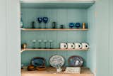 Bespoke kitchen shelving provides a beautiful space to display special pieces.