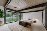 The master bedroom also has sliding doors that lead out to the pool.&nbsp;