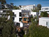 Exterior, House Building Type, Flat RoofLine, Wood Siding Material, and Stucco Siding Material A look at the multi-level home in the Hollywood Hills.   Photo 8 of 8 in Architect Abeer Sweis Shares Fire-Resistant Building Strategies