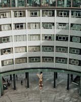 The&nbsp;ring-shaped building was formerly the BBC Television Center. A refurbished Helios statue stands in the courtyard.&nbsp;