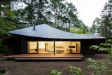 Located in Karuizawa, a popular summer resort town in Japan’s Nagano Prefecture, Four Leaves is a weekend getaway designed to accommodate the homeowner and their guests in a lush, sylvan setting. Designed by Kentaro Ishida Architects Studio (KIAS), the highlight of the stunning, 2,400-square-foot house is its sloping, angular roof sections that are delicately assembled to resemble fallen leaves.