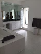 Myers' first move in the master bath was to flip-flop the placement of the bathtub and the vanity. 