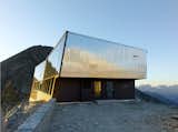 Designed by Savioz Fabrizzi Architects, the Tracuit Hut is a mountain shelter run by the Swiss Alpine Club. The shelter is located above Zinal in the canton of Valais, at an elevation of 10,780 feet. It's named after the Tracuit Pass in which it is located.