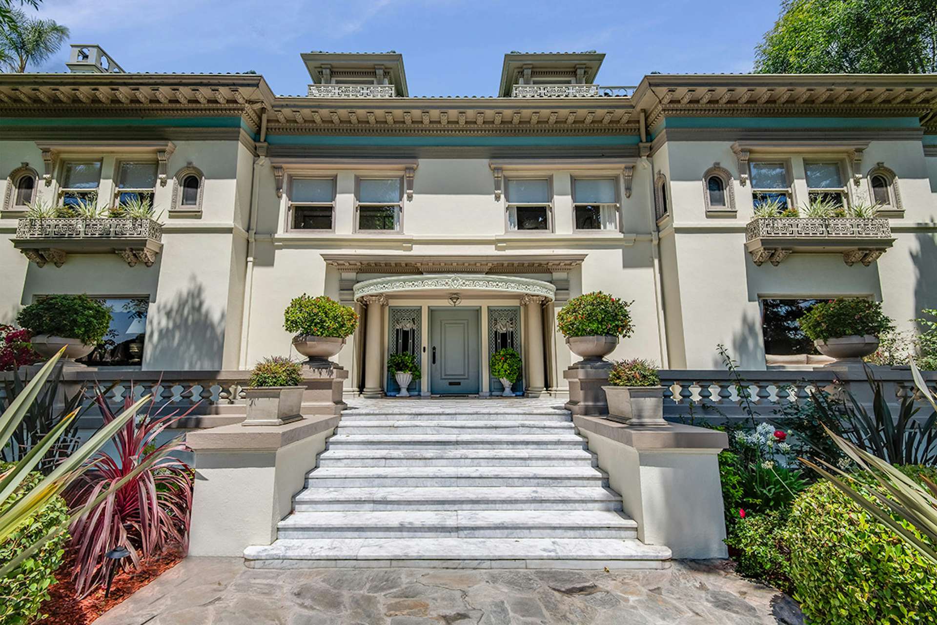 Photo 1 of 12 in Muhammad Ali’s Massive Hancock Park Mansion Hits the