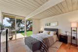 The master bedroom has sliding glass doors which lead to the backyard.&nbsp;