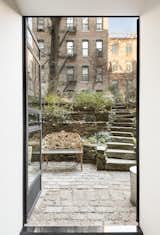 &nbsp;Steel casement French doors open to the shared garden.&nbsp;