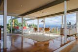 The post-and-beam construction is beautifully complemented by walls of glass which frame the home's breathtaking panoramic views.