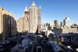 The condo looks out on sweeping city views.