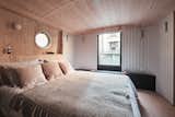 The houseboat has a single bedroom with a round porthole—lest you forget where you are staying.&nbsp;