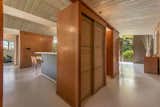 The home features original wood-paneled closets with Japanese-style sliding doors.