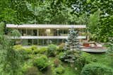 The 5,000-square-foot midcentury home sits on 2.24 acres of woodland in Armonk, New York.