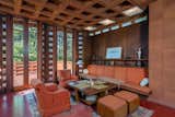As with most Usonian homes, the living room features high ceilings. The living room also opens to an outdoor terrace.
