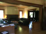 The original living room opened into the dining room, but both rooms received limited daylight.