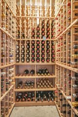 The garage features a custom redwood wine cellar.