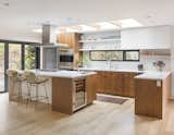 Portland-base pastry chef Andrea Nicholas purchased a 1953 midcentury ranch whose 2,500 square feet needed "a lot of TLC." Nicholas hired architect Risa Boyer to design the renovation, which involved opening up the kitchen to the dining room and creating a contemporary open-plan living space.