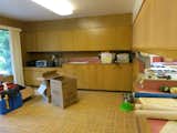 With "pepto-colored countertops and stained linoleum flooring" the original kitchen was dark and in desperate need of updates.&nbsp;