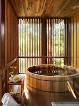 The master bath includes an envy-worthy cedar soaking tub from Roberts Hot Tubs.