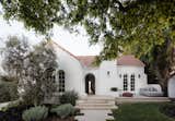 The family were drawn to the Spanish Colonial–style home’s charming exterior—which was not changed in the renovation.&nbsp;