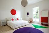 Circles are found throughout the decor and figure prominently in the second bedroom.&nbsp;