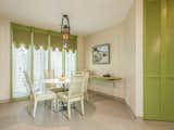 The breakfast nook is a fresh shade of green.&nbsp;