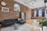 Atlanta Industrial  Loft Castleberry Hill Living Room Exposed Brick Hardwood floors