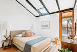 A skylight and a door to the outside are featured in the second bedroom.&nbsp;