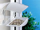 Designed by Louise Christ Frederiksen, the Piep Show birdhouse is made of high-quality plastic and aluminum and can be affixed to any window pane with four suction pads. It is easy to move and relocate, should you or your birds fancy a change of scenery.&nbsp;