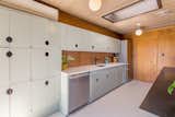 The kitchen has received recent updates and is outfit with ample storage.