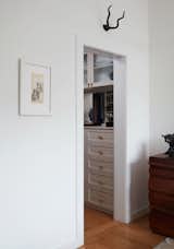 The master closet has been built out with an excellent shelving system from Rakks.&nbsp;