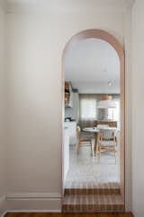 An arched doorway and two brick steps were added to enhance the sense of drama as the new environment unfolds. 