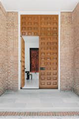 The original door was removed during the renovation, restored, and then replaced toward the project’s completion. The carved wood door is 11 feet tall, and Uzcategui says it adds “a distinctive element essential to the home’s history and sense of style.”