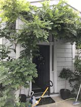 Although the Victorian-style home had been updated over the years, it had been poorly maintained. Despite that, both the homeowners and the architect knew that there was history worth preserving and went to great lengths to restore the facade, "as close to its existing condition as possible".  Photo 1 of 38 in Before & After: A Victorian Cottage Expands With a Rear Addition to Accommodate a Growing Family