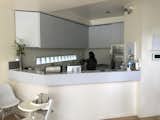 The kitchen was in need of updates and didn't fit the bright and open vision that the Scandizzo family had for their home.  Photo 11 of 38 in Before & After: A Victorian Cottage Expands With a Rear Addition to Accommodate a Growing Family