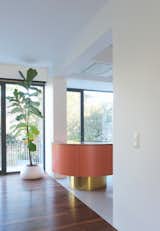 "The round form was a spatial decision," shares Otten. "The client wanted an island in relation to the dining room."
