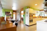 After a full renovation, the kitchen is equipped with modern appliances.