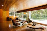 The redwood tongue-and-groove ceilings, cork floors with radiant heating, and an expansive wall of glass in the living room are just a few of the home’s original midcentury features.&nbsp;