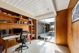 The fourth bedroom, in use as an office, has built-in shelving and overlooks the atrium.&nbsp;