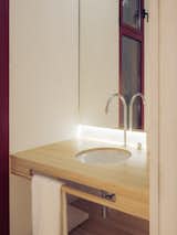 The bathroom was outfitted with a custom sink that’s optimized for the tiny space.&nbsp;