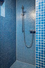 Beautiful blue tiles line the bathroom.&nbsp;