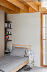 One of the kids’ rooms features built-in shelving.